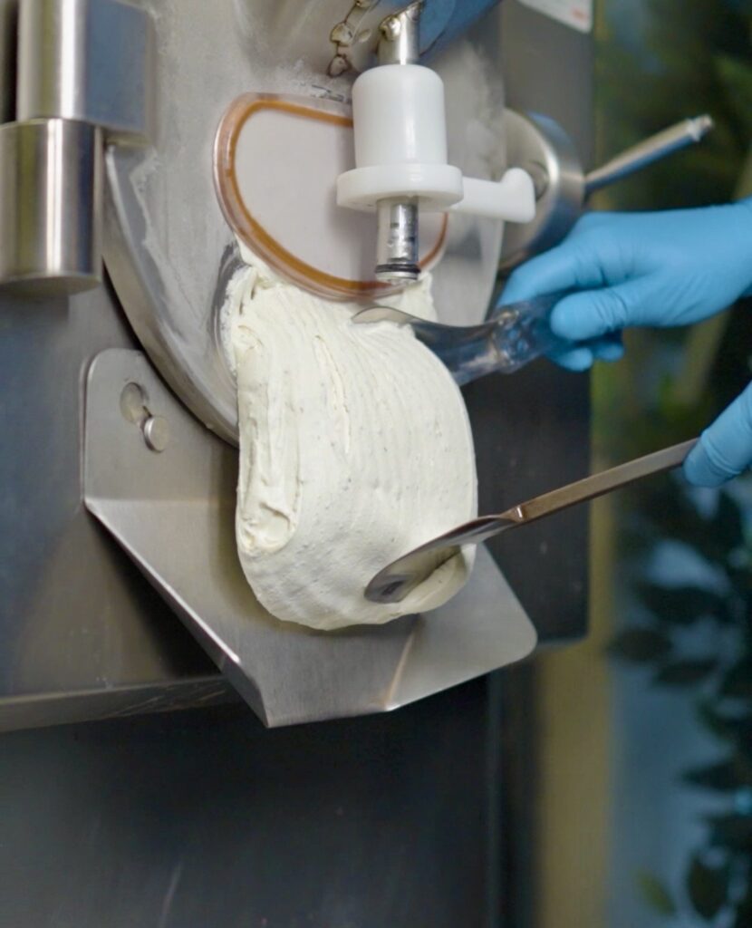 Fresh artisan gelato being churned using the traditional Italian mantecazione process at La Gelatiera London.