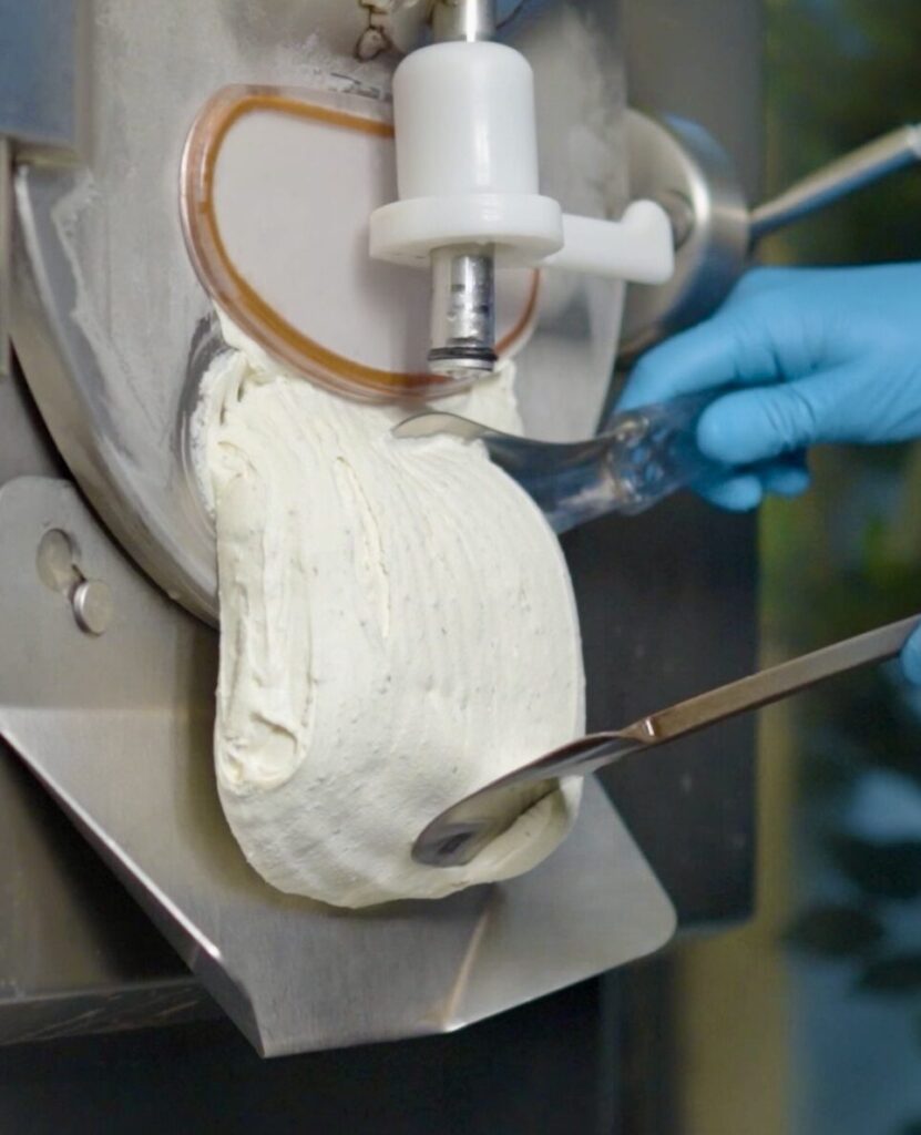 Fresh artisan gelato being churned using the traditional Italian mantecazione process at La Gelatiera London.